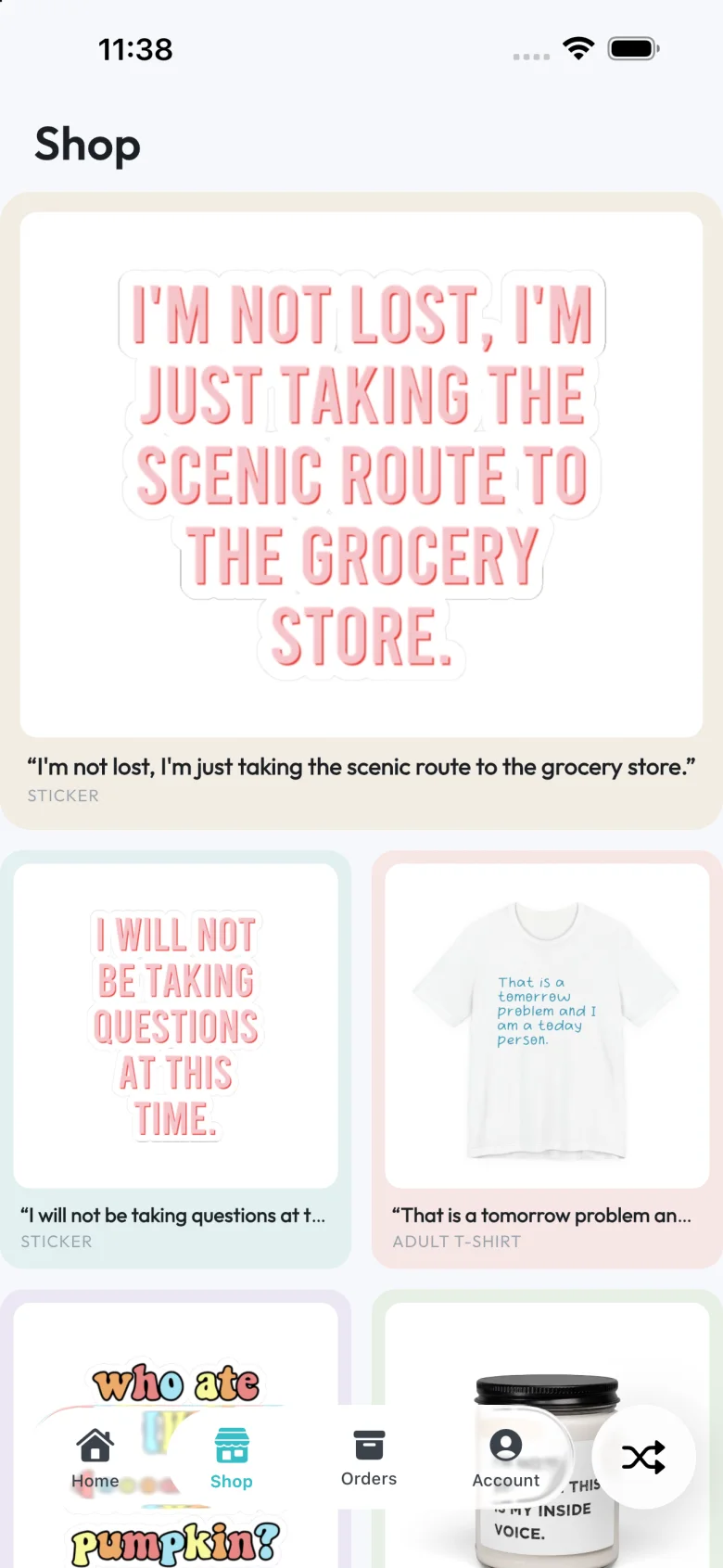 The Shop: stickers, a tee and a candle printed with the group’s own quotes
